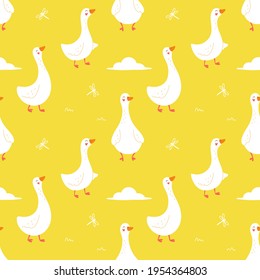 Seamless pattern of cute geese on a yellow background. Cartoon vector illustration.