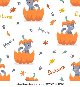 Seamless pattern with cute gray kitten, cat sitting in the ginger, red cut pumpkin and pumpkin cover on head isolated on white. Vector illustration, print for packaging, fabrics, wallpapers, textiles.