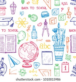 Seamless pattern with cute hand drawn educational tools including pencils; pens; eraser; globe; brush; and others. Vector hand drawn back to school collection