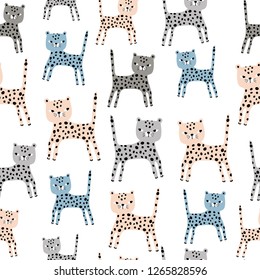 Seamless pattern with cute hand drawn leopards. Creative childish texture. Great for fabric, textile Vector Illustration