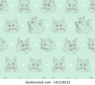 Seamless pattern with cute hand drawn cats on blue background