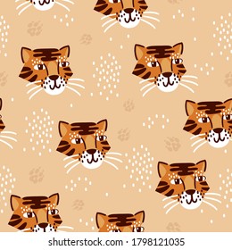 Seamless pattern with cute hand drawn tiger faces. Childish background for fabric, wrapping, textile, wallpaper, apparel.. Vector Illustration
