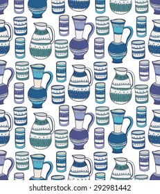 Seamless pattern with cute hand drawn pitcher and cups. Kitchen background in doodle style. Vector