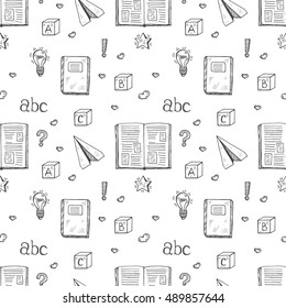 Seamless pattern with cute hand drawn books and letters. Vector