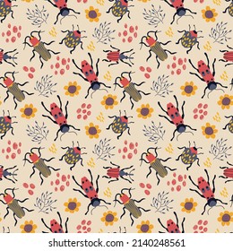 Seamless pattern with cute hand-drawn beetles. Design for fabric, textile, wallpaper, packaging.	