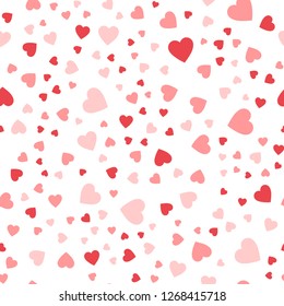Seamless pattern of cute hearts of pink color on a white background to celebrate Valentine's Day. Wallpaper for season decoration, wrapping paper, clothing prints. Vector illustration.