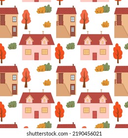 Seamless pattern with cute houses. Autumn trees and houses autumn pattern.