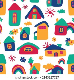 Seamless pattern of cute houses. Funny houses of different shapes. Vector illustration.