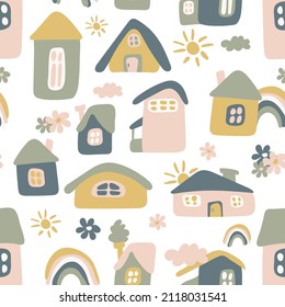 Patrón sin foco de bonitas casas en colores pastel. Casas divertidas de diferentes formas. Ilustración vectorial.