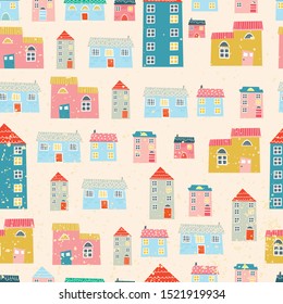 Seamless pattern with cute houses. Wallpaper, packaging paper, fabric design.