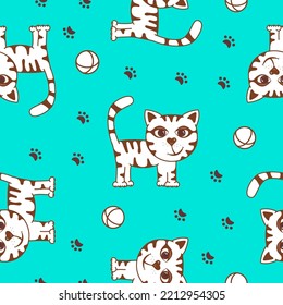 Seamless pattern with a cute kitten and a ball