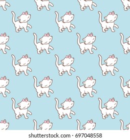 Seamless pattern with cute kitties stickers isolated on blue background. Vector illustration.