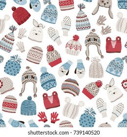 Seamless pattern with cute knitted hats, vector winter illustration in Christmas style on white background.