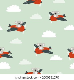 Seamless pattern with cute koala on plane. Baby print with cartoon pilots.
