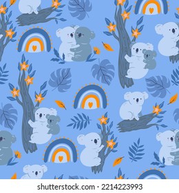 Seamless pattern with cute koalas, rainbows and leaves. Vector graphics.