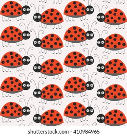 Seamless pattern with cute ladybirds