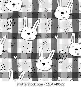 Seamless pattern with cute little bunny. vector illustration