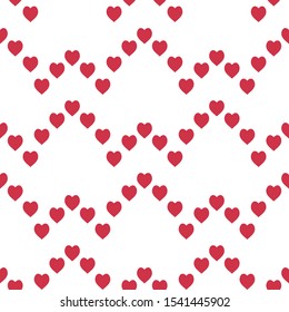 Seamless pattern with cute little red hearts on white background. Vector image. 