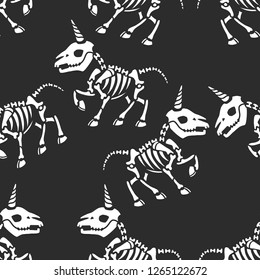 Seamless pattern. Cute little skeletons of unicorns. Anatomy of fantastic animals. Great for greeting cards, halloween party invitations, t-shirt printing and more. Halloween illustration.