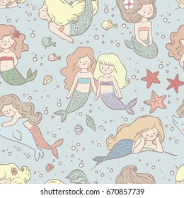 Seamless pattern with cute mermaid