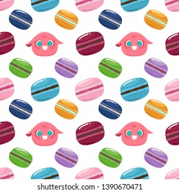 Seamless pattern with cute monsters cartoon character and macarons  isolated on white background. Use for printing on textiles, t-shirt, cards, wrapping paper, poster, fabric print. 