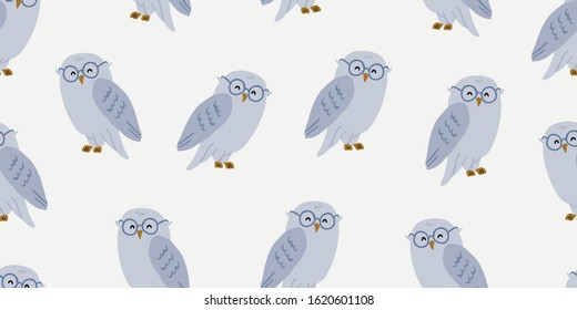 Seamless pattern with cute owl in eyeglasses. Cute kids animal pattern on white background. Cute owl design.  Perfect for kids textile graphic tees, fabric, textile, posters, stickers