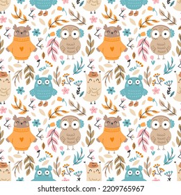 Seamless pattern with cute owl. Twig and flower. Background for sewing children clothes and printing on fabric. Packing paper. Cute doodle illustration. Autumn print.