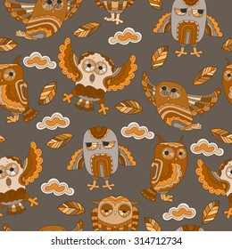  	 Seamless pattern with cute owls, autumn leaves and clouds on a gray background