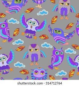  	 Seamless pattern with cute owls, autumn leaves and clouds on a gray background