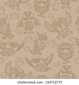  	 Seamless pattern with cute owls, autumn leaves and clouds on a brown background