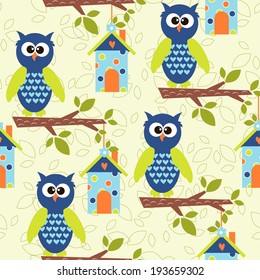 seamless pattern with cute owls and colorful houses for birds. vector illustration