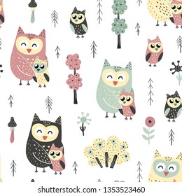 Seamless pattern with cute owls - mother and baby. Forest vector illustration