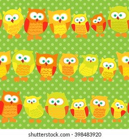 Seamless pattern with cute owls on green dotted background. Vector illustration