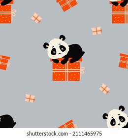 Seamless pattern. Cute panda lies on large gift on gray background with boxes. Vector illustration. Children collection for design, decor, packaging, wallpaper, textiles
