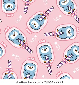 Seamless pattern of cute penguin in candy package on pink background.Bird animal character desing.Sweet and dessert.Kawaii.Vector.Illustration.