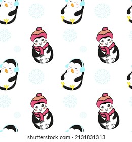 Seamless pattern with cute  penguins and snowflakes on a white background. Vector design for fabric, baby clothes, textile, wrapping paper, wallpapers, prints, decorations, packaging.