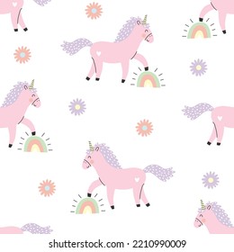 Seamless pattern with cute pink unicorn, rainbow and flowers. Vector illustration