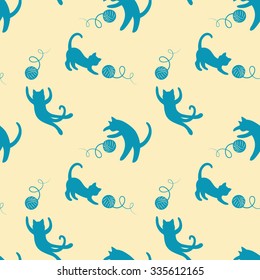 Seamless pattern with cute playing cats.Textile cats pattern. Cute cats pattern. Funny playing cats background. Colorful fabric cats pattern. Vector cats pattern.Kitten pattern.