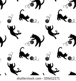 Seamless pattern with cute playing cats.Textile cats pattern. Cute cats pattern. Funny playing cats background. Monochrome  fabric cats pattern. Vector cats pattern. Kitten pattern.Cats background.