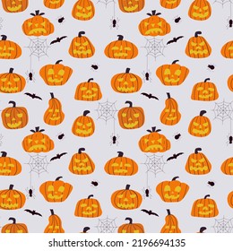 Seamless pattern with cute pumpkins for Halloween. Hand drawn vector illustration.