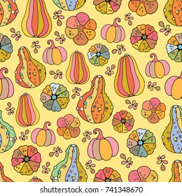 Seamless pattern with cute pumpkins. Lovely vector illustration and design for fabrics, textile, wallpaper and background.