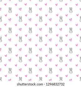 seamless pattern cute rabbit with heart white background.