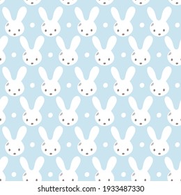 Seamless pattern with cute rabbit muzzles, flat handdrawn style. Geometric ornament with little bunnies. Kitten’s pretty heads with little ears. Rhombus greed style pattern vector illustration.