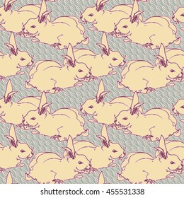 Seamless pattern of the cute rabbits on scribble background.