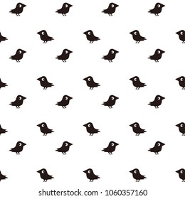 Seamless pattern of cute raven/crow vector on white background. Decorative texture of funny birds.