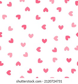 Seamless pattern with cute red mini hearts