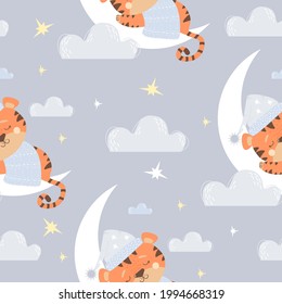 Seamless pattern with cute sleeping tiger. animal in blue nightcap and blanket sleeps on the moon on a light purple background with clouds and stars. Vector illustration. Kids Scandinavian Collection