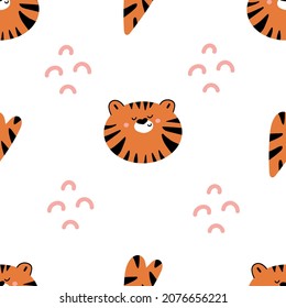Seamless pattern of cute tiger head and hearts on white background. Nursery print design. Symbol of New Year 2022.