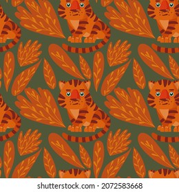 Seamless pattern with cute tigers with orange leaves on a green background. Vector pattern. Animal and botanical background for fabric, clothing, wallpaper, wrapping paper, stationery. 