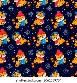 Seamless pattern of cute tigers play winter, funny characters symbol Happy New Year, set characters illustration on dark blue background. Vector art